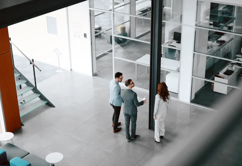 business-people-discussing-plans-in-modern-officejpg